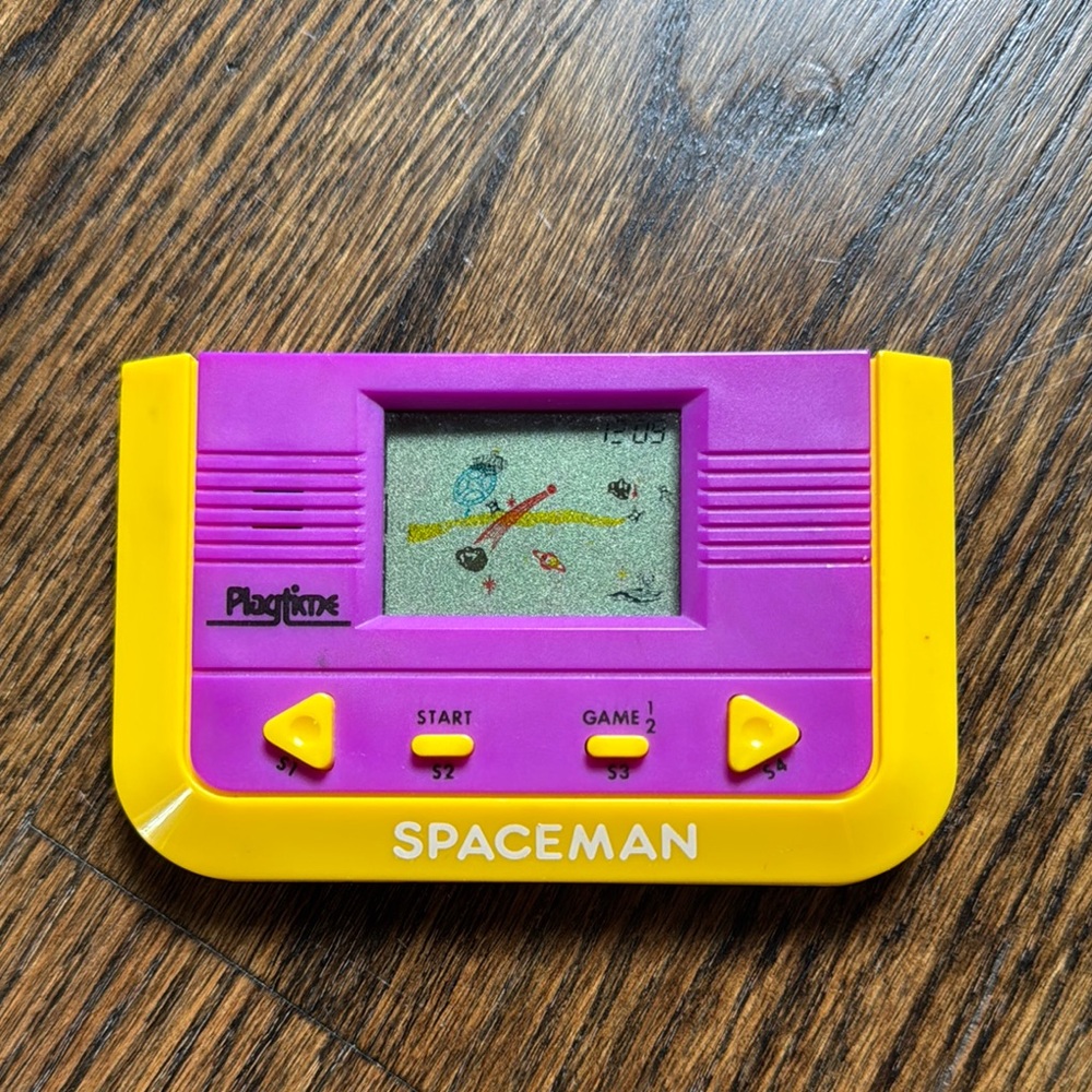 Vintage Plug & Play Spaceman Handheld Game